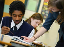 Teacher Helping a Student